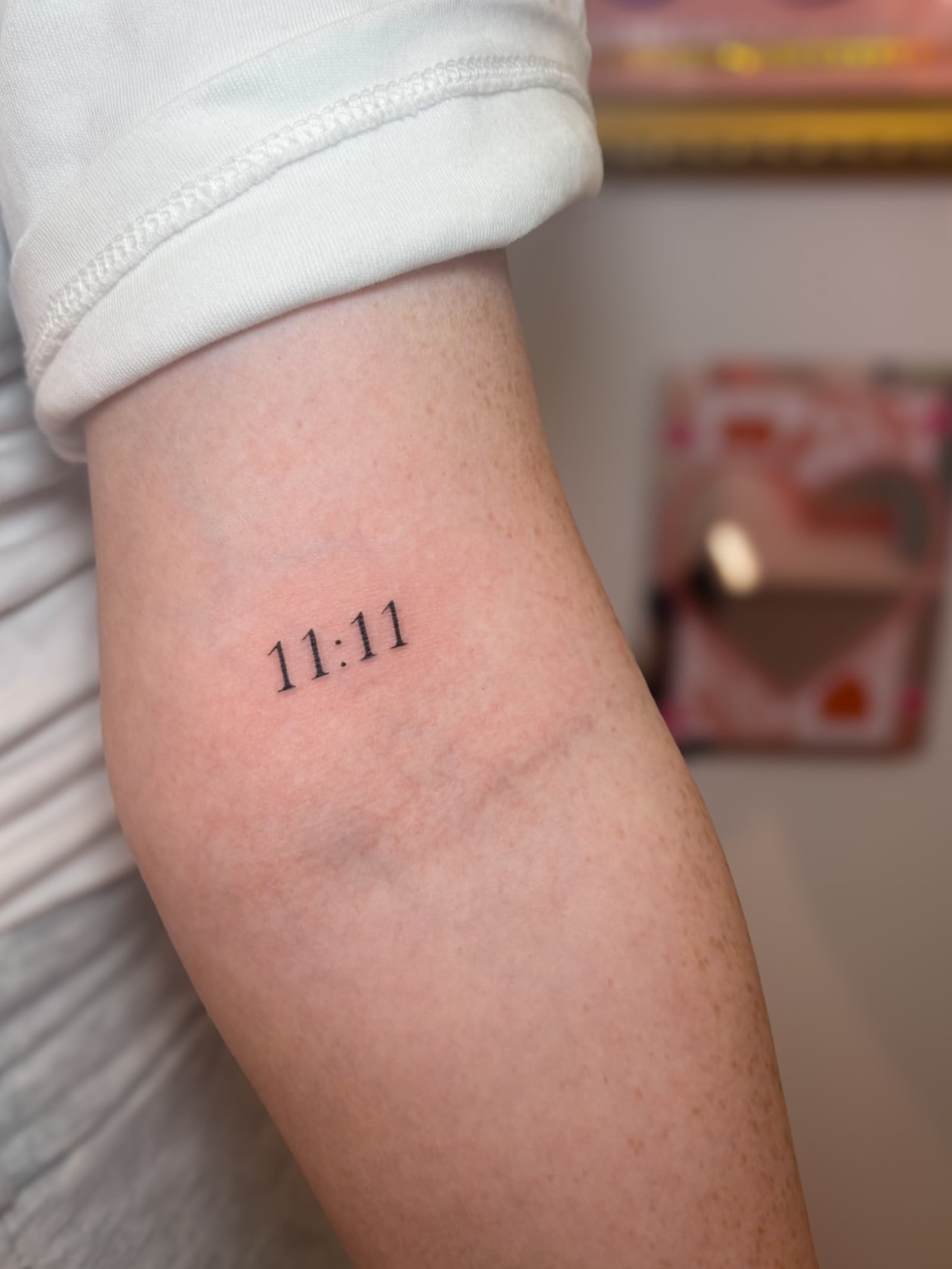 Small fine line date numbers tattoo